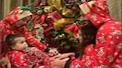 19 صورة ترصد احتفال محمد صلاح بالكريسماس مع زوجته وبناته