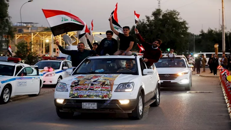 العراقيون يحيون الذكرى الثامنة للانتصار على تنظيم داعش